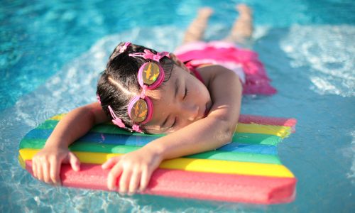 Girl_with_styrofoam_swimming_board