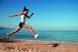 woman-running-on-beach